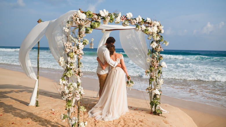 Couple getting married at beach