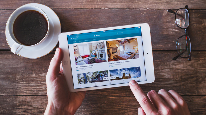 Airbnb search tablet on table