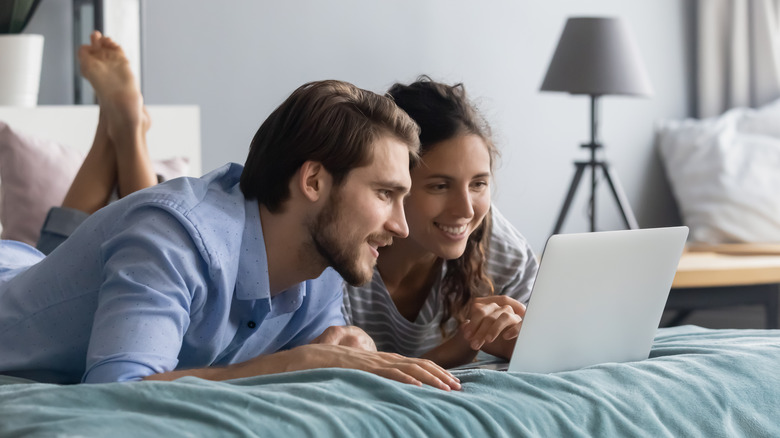 couple looking at laptop