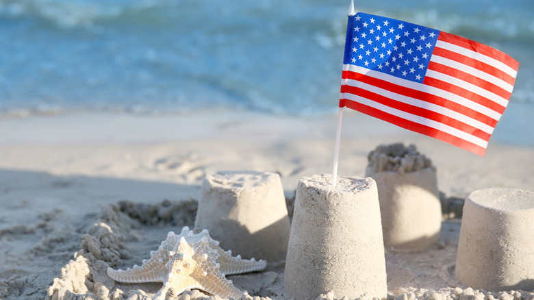 Sand sculptures with flag