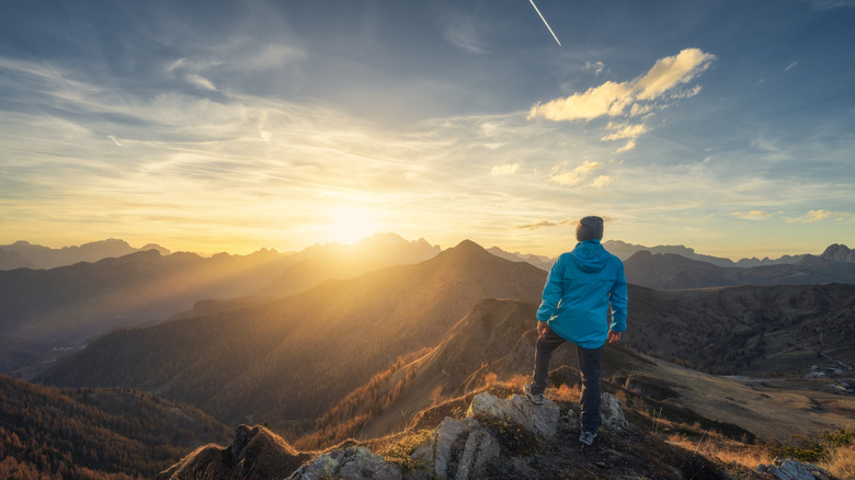 guy standing on mountaintop