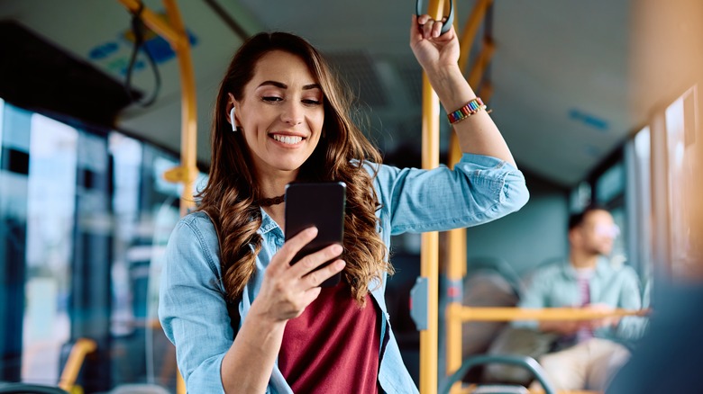 Woman using public transporation