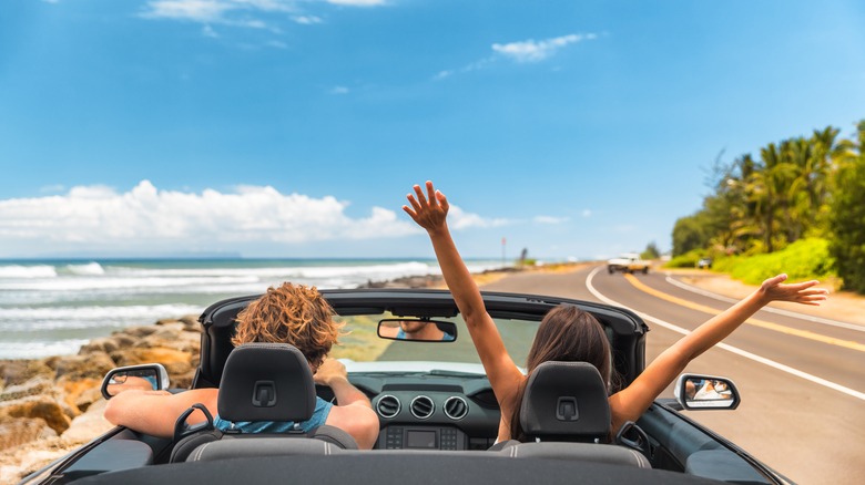 People enjoying their rental car