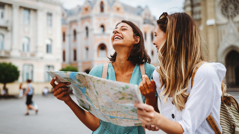 Two women looking at a map