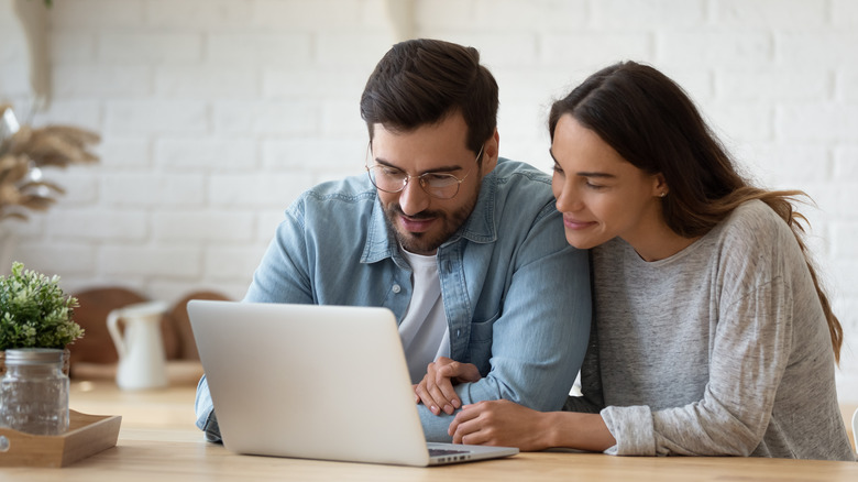 Couple looking at computer