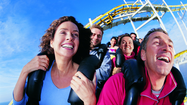 Riders on a rollercoaster