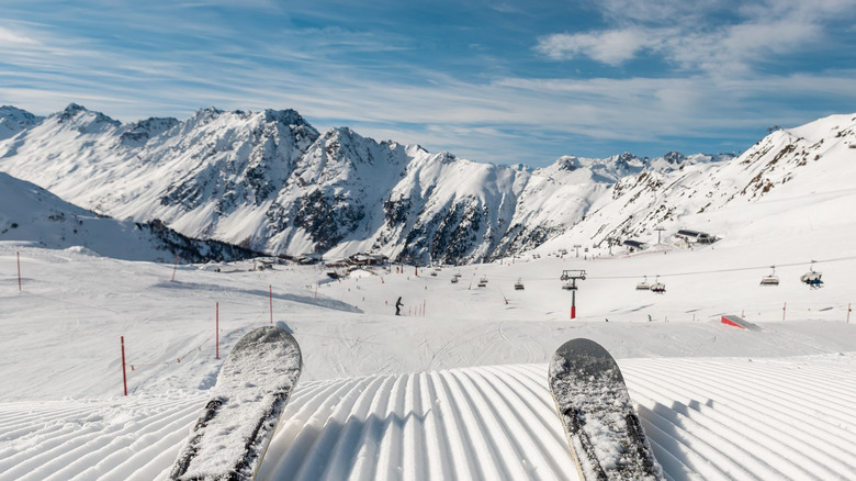 Skis over mountain slope