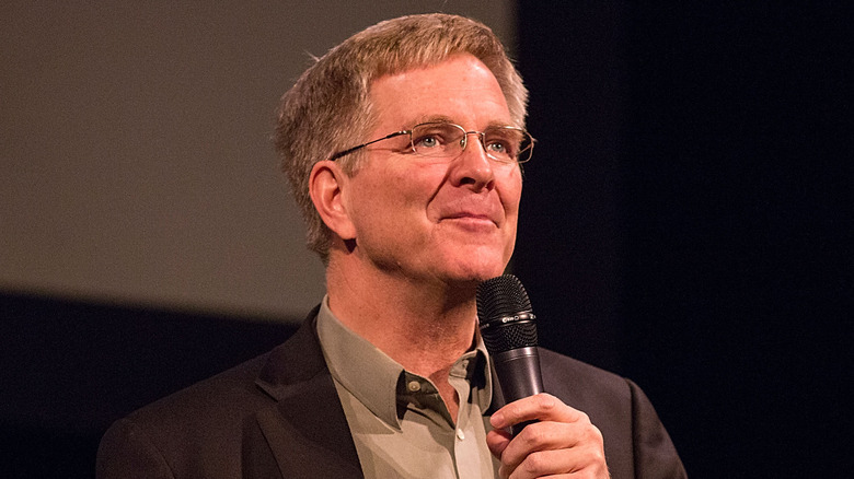 Rick Steves speaking on stage