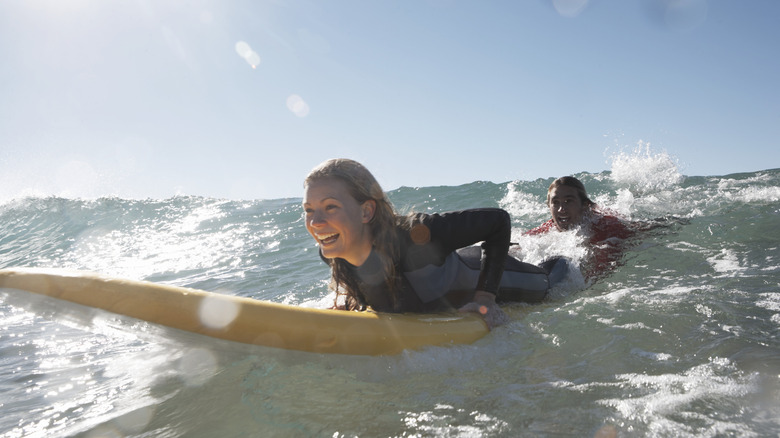 woman surfing