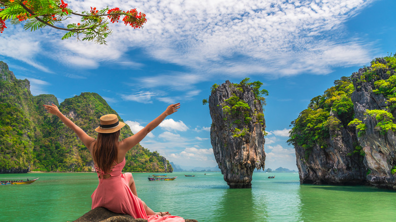 Traveler relaxing on rock