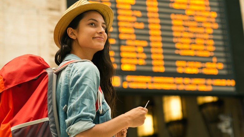 backpacker at train station