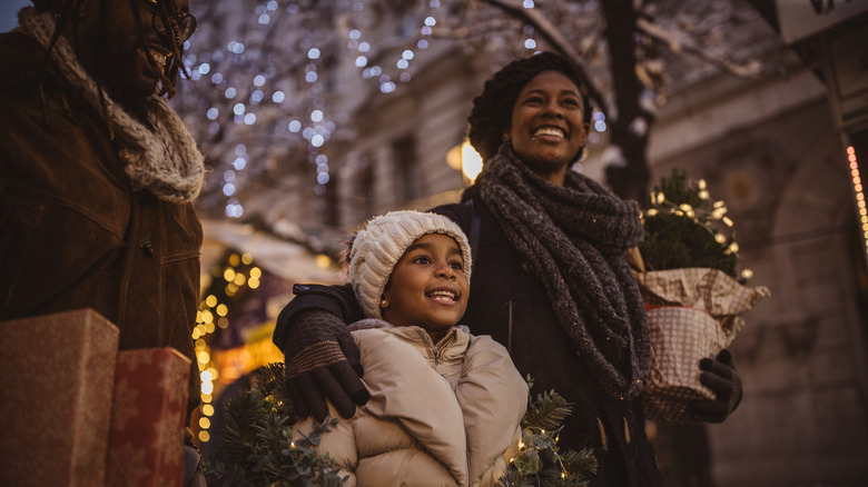 family christmas shopping outside