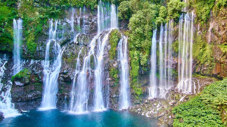 Waterfalls cascading into a grotto