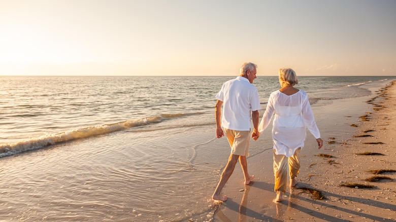 Couple walking on a beach