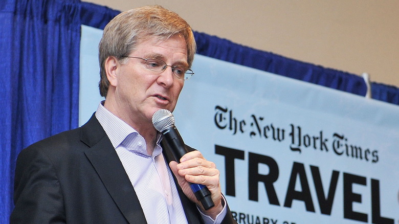 Rick Steves speaking on stage