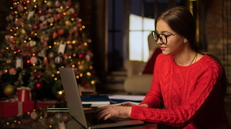 Woman making a booking on the computer