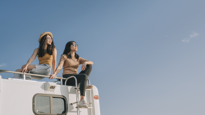 Couple sitting on a RV