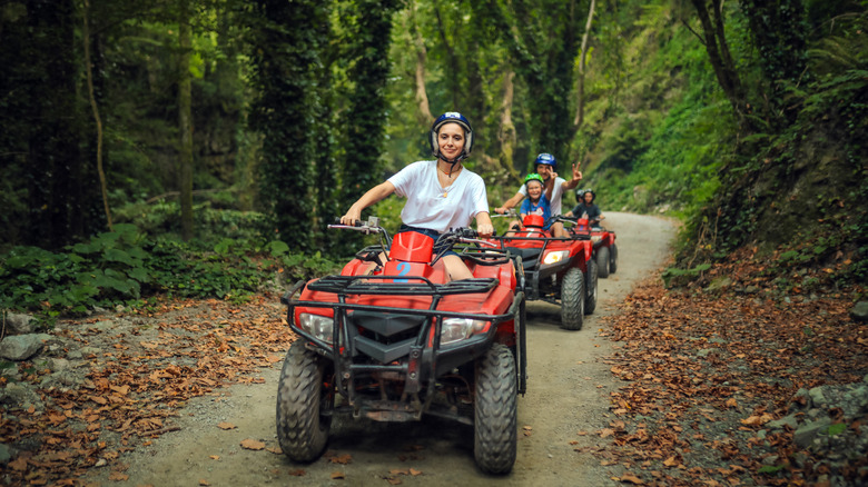 Famiy riding ATVs