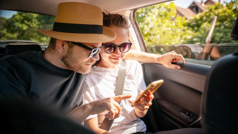 Couple looking at a phone