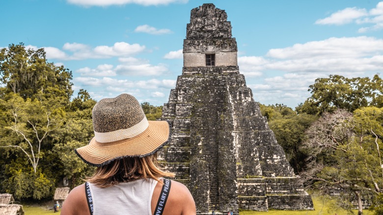 Tourist observing ruins