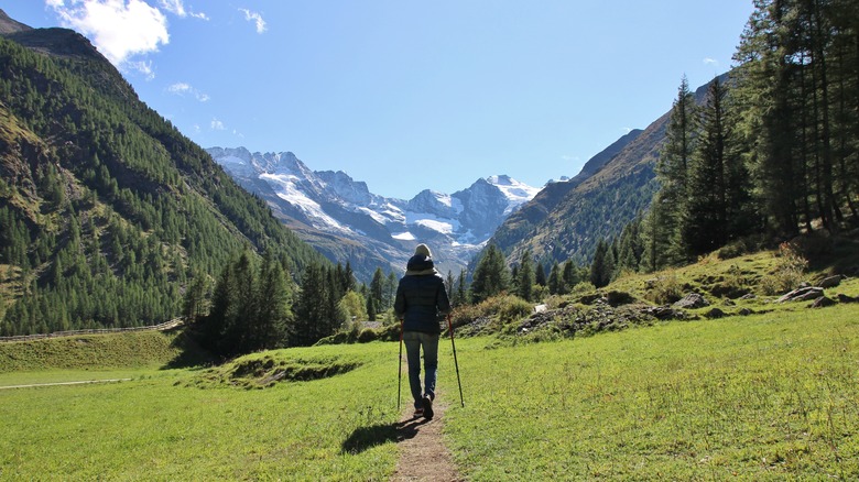 Person hiking in valley