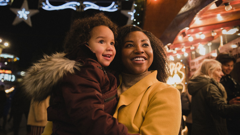 woman and child enjoying holiday