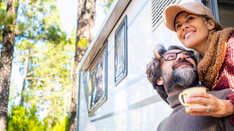 couple camping in RV